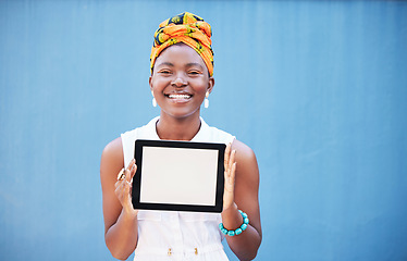 Image showing Portrait of black woman, tablet and screen, mockup or web space for digital marketing, advertising or branding app on blue background. Happy girl, digital technology and mock up for product placement