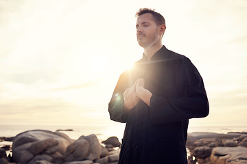 Image showing Meditation, zen and tai chi with man at beach for spiritual, fitness and healing energy at sunrise. Peace, relax and balance with guy and breathing exercise for philosophy, faith or wellness training