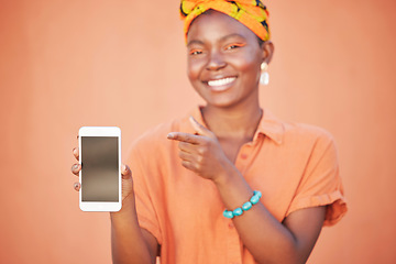 Image showing Mockup, black woman and blank smartphone screen for marketing, advertising and against brown studio background. Female, Jamaican lady and phone for social media, search internet and online website.