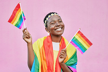 Image showing Black woman, flag and pride with lgbtq portrait, freedom and support queer community with happiness against pink background. Rainbow, sexuality and free to love mockup, celebrate lgbt and equality.