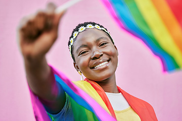 Image showing LGBT, pride and portrait of black woman with rainbow flag for self love, individuality and support for the LGBTQ community. Equality, human rights and face of bisexual, gay or lesbian African girl