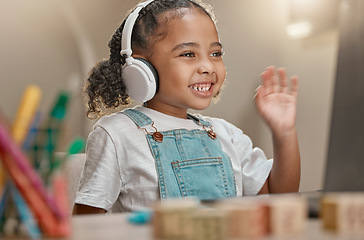 Image showing Video call, headphones and child in e learning on laptop, home desk and hello for virtual class education, communication and listening. Audio, pc technology and kindergarten girl in language learning