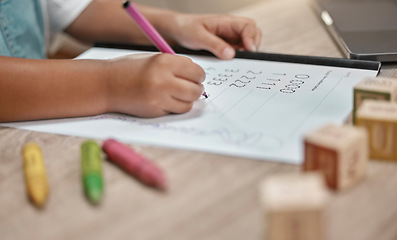 Image showing Education, paper and hands of child writing math homework, learning and study numbers for youth child development. Table, pen and young school student studying mathematics in kindergarten classroom