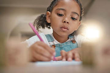 Image showing Student, child learning and writing in notebook for development, fine motor skills and home schooling. Education, knowledge study and kid creative drawing or write on paper with pencil on home desk