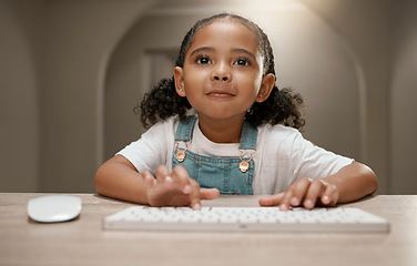 Image showing Child, internet and keyboard with a girl browsing online to learn and gain knowledge or education. Lesson, kid and computer with children distance learning from home for school assignment