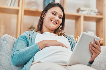 Image showing Digital tablet, pregnant and happy woman relaxing on a sofa in the living room of her home. Calm, pregnancy and lady resting and watching a video on social media or a movie online with mobile device.