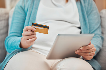 Image showing Tablet, hand and credit card for online shopping, ecommerce and banking using a mobile app. Technology, card and fintech for payment, budget or bills on the internet with debit card for e commerce