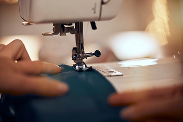 Image showing Design, clothes and closeup of sewing machine with fabric for clothing production, fashion design and tailor. Manufacturing, creative and hands of fashion designer working with textile in workshop