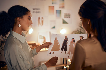 Image showing Fashion, collaboration and night with a business black woman team in discussion of design in their office. Meeting, planning and overtime with a female employee and colleague talking about style