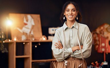 Image showing Fashion, designer and black woman at night for small business startup, creative inspiration and manufacturing process portrait. Happy woman, design tape and clothes boutique in dark workspace studio