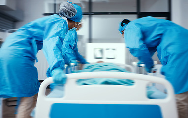 Image showing Emergency, operation and hospital with a doctor and team rushing to an operating theater with a patient. Nurse, insurance and healthcare with a medical group getting ready for life saving surgery