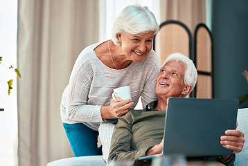 Image showing Senior couple, laptop and happy at. home on lounge sofa talking and reading online for online shopping, social media or savings on banking website. Old man and woman together with coffee and wifi
