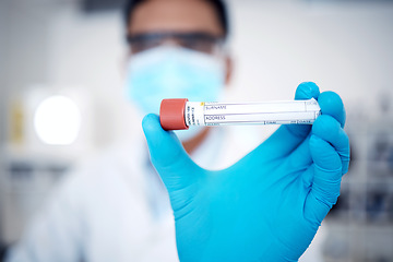 Image showing Closeup, test tube and lab for dna results, experiment and in laboratory with gloves for protection. Male scientist, man and medical for safety for virus, sickness or blood sample for cure or illness