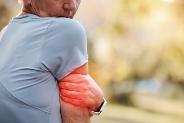Image showing Senior woman and workout arm injury inflammation discomfort on outdoor walk, run or jog. Active retirement person on exercise break with pain from accident, aging or elderly arthritis.
