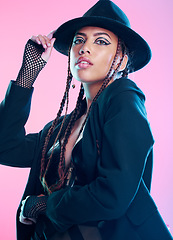 Image showing Woman, beauty and fashion with stylish fine art in makeup, cosmetics or costume against a pink studio background. Portrait of female model posing in fashionable style, clothing and cosmetic on mockup