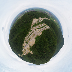 Image showing 360 spherical panorama of aerial top vew of winding road in the mountains