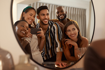 Image showing Group of friends, phone and mirror selfie for party, celebration or New Years together. Young people reflection, diversity or smartphone to connect, smile or social gathering to enjoy dinner or relax