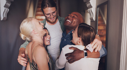 Image showing Friends, hug and love while happy and excited at a party or social gathering with diversity, support and happy energy at a house celebration. Men and woman in huddle or circle to celebrate a reunion