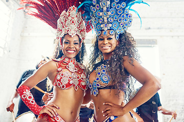 Image showing Brazilian dancers, carnival or women in party costume with feather accessory or glitter bra in event. Portrait, happy smile or dance friends in samba fashion or New Year festival clothes