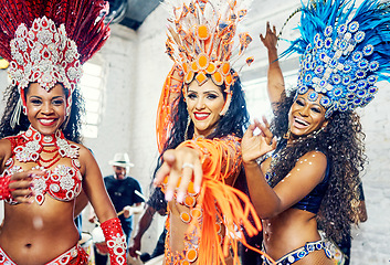 Image showing Brazil carnival, women and samba dancing for celebration at party, event or festival with costume for live music performance. Happy female group doing culture dance at Rio de janeiro new years show