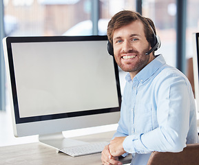 Image showing Call center, computer and mockup with businessman in office for customer service, technical support or consulting. Technology, digital and website with employee and microphone for help desk advisor