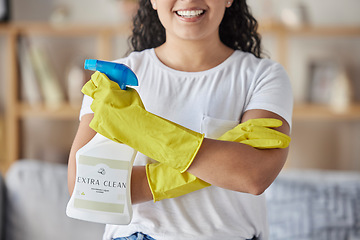 Image showing Cleaning, product and spray bottle with woman in living room for hygiene, disinfection or bacteria safety. Germs, dust and chemicals with girl cleaner and arms crossed at home for housekeeper service