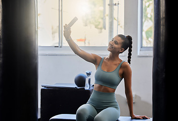 Image showing Fitness, gym and woman taking selfie with phone in home studio for social media post, wellness blog and network. Health, sports and happy girl with smartphone after exercise, workout and training