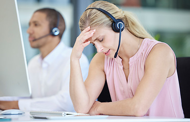 Image showing Stress, headache and call center consultant in the office doing online customer service consultation. Burnout, tired and frustrated ecommerce sales woman or telemarketing agent working in workplace.