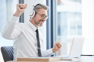 Image showing Relax, music and dance with businessman and laptop for streaming, freedom and winner. Energy, celebration and online with employee listening at desk in corporate office for radio, disco or rock break