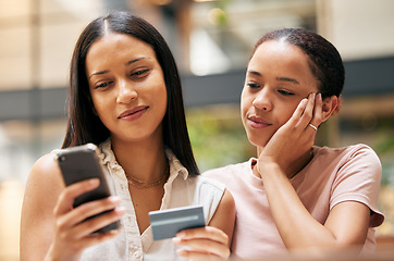 Image showing Ecommerce, credit card and smartphone with online shopping and payment, woman and young girl buying with banking and internet. Mother, teen and retail customer, virtual sale with discount and shop.