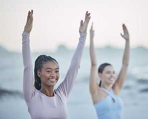 Image showing Yoga friends, fitness and exercise outdoor in nature for happiness, peace and balance during tree pose workout to relax. Black woman with pilates partner at beach for morning mindfulness for health