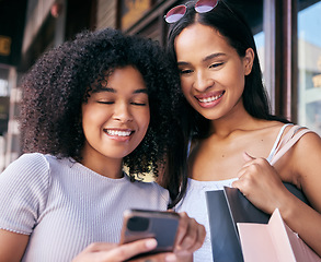 Image showing Friends, phone and shopping in the city on a social network for retail discounts and sales. Cellphone, communication and friendship in a town for buying, purchase and luxury shopper females