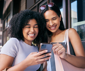 Image showing Women, phone and online shopping in Cape Town street, read ecommerce website on retail shopping app in city. Happy friends, black woman and mobile tech, customer or promo notification on smartphone