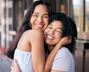 Image showing Friends, love and care with hug while bonding outside in the city during a summer trip. Bond, loving and caring friendship with cheerful women embrace with affection in a positive, happy relationship