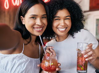 Image showing Selfie, black women and cocktails at pub, celebration and enjoy happy hour together. Young females, African American girls and drinking for event, bonding and happiness at party, and friends relax.