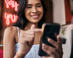 Image showing Woman, phone and cafe for texting or browsing online social media for a meme or content in a restaurant. Coffee shop, mobile and social network with a female customer reading a blog on the internet