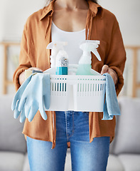 Image showing Cleaning service, product basket and cleaner hands for living room home, startup employee with plastic bottle, container and cloth. Woman, hygiene liquid and bacteria spray for spring cleaning career