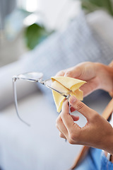 Image showing Cleaning, glasses and dust with hands of woman for dirt, disinfection and ophthalmology. Fabric, frame and microfiber tissue with girl wipe spectacles lens for eye care, optometrist or antibacterial