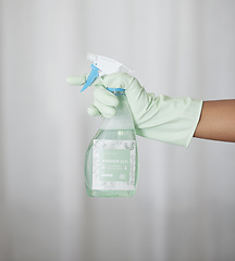 Image showing Spring cleaning, hands and bottle with chemical spray, eco friendly product and disinfection of bacteria, dirt and household maintenance. Closeup of cleaner, cleaning service and liquid detergent