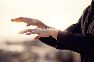 Image showing Man, hands or tai chi fitness on sunset beach in relax workout, training or exercise for chakra energy, mental health or body movement routine. Zoom, zen or martial arts person in nature sunrise yoga