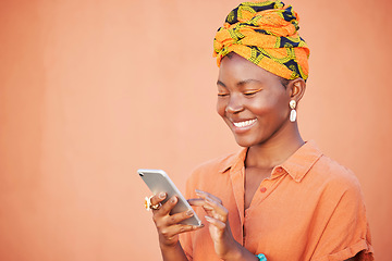 Image showing Black woman, head scarf and smartphone for connection, communication and reading online on studio background. Jamaican lady, phone and girl smile with traditional head wrap, marketing and mockup.