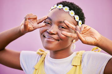 Image showing Portrait, peace or face of happy black woman with smile, sunflower crown or positive success mindset. Purple wall, hands or African gen z girl on holiday vacation with cool fashion, pride or freedom