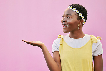 Image showing Woman, hand and choice with trendy, edgy style on a pink studio background for mockup marketing. Advertising, gesture and female with idea to choose with a fashionable, stylish outfit on a backdrop