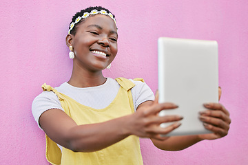 Image showing Black woman, selfie or tablet for smile, flower crown or happiness by pink wall in spring on social media. Happy influencer woman, digital photo and head flowers in fashion, beauty or social network