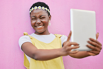 Image showing Digital tablet selfie, African and black woman post picture memory to social media, online web app or social network. Beauty flower crown, facial expression and tech girl with spring fashion on wall
