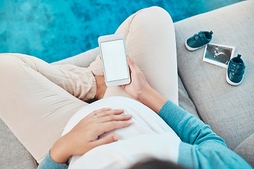 Image showing Pregnant, woman and blank phone for social media sonogram post or announcement at home. Pregnancy, mother and internet communication about baby picture or ultrasound with shoes for media message