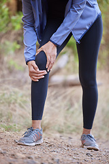 Image showing Fitness, knee pain and hands massage of woman in forest hiking, workout or running accident and body zoom for health insurance. Legs injury, joint pain or arthritis of athlete, runner in medical risk