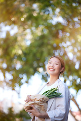 Image showing Shopping, vegetables and grocery mockup of customer with eco friendly bag, market sales product or commerce store deal. Tree mock up, vegan nutritionist portrait or Asian girl with retail health food