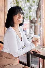 Image showing Happy customer, black woman and relax in coffee shop, restaurant or bistro for lunch, latte and easy lifestyle. Portrait, cafe and female enjoy drink, cappuccino and coffee break alone with happiness