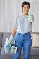 Image showing Cleaner, thumbs up and portrait of a woman with supplies to clean the living room of a house. Happy, smile and female maid or housewife with a positive mindset for cleaning an apartment, loft or home